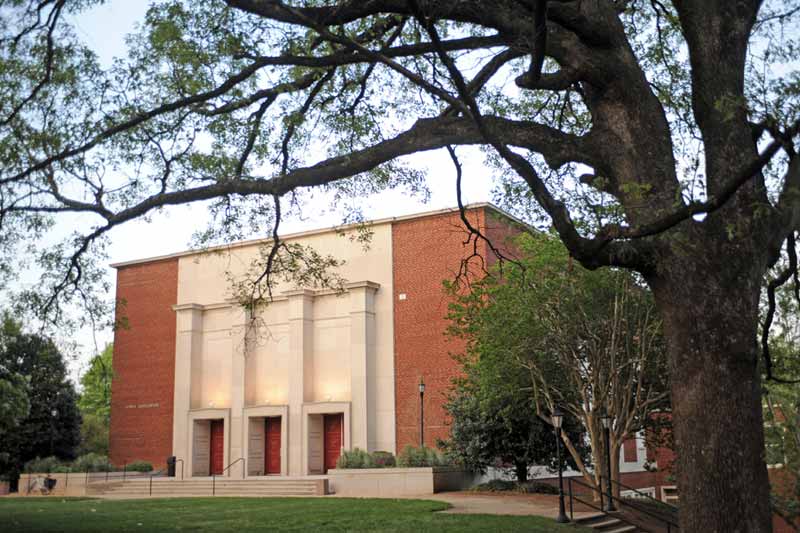 Large brick building with columns