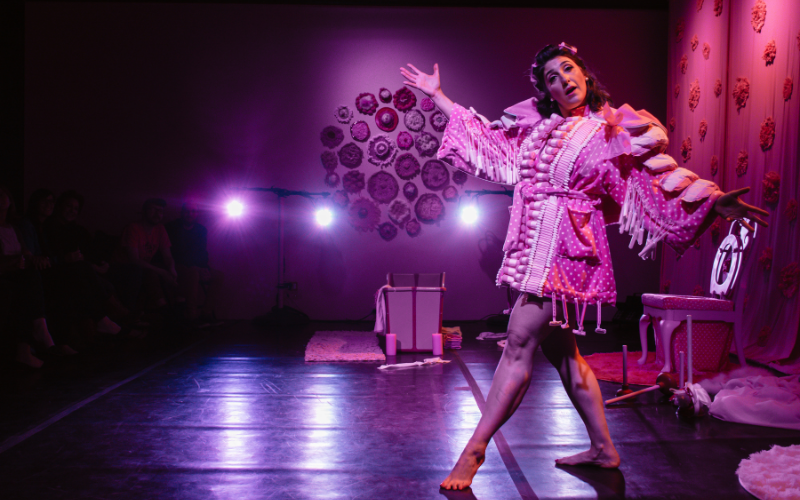 Sara Juli onstage wearing an elaborate costume