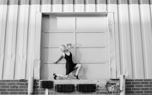 Justin Tornow poses in front of a loading dock